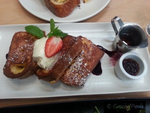 Brioche French Toast - Served with cold drip coffee maple pearls, pure maple syrup, blueberry molasses & double whipped cream