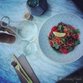 Happy Zucchini Linguine – Raw Zucchini Spirals, Red Pesto, Cherry Tomatoes, topped with Fresh Herbs